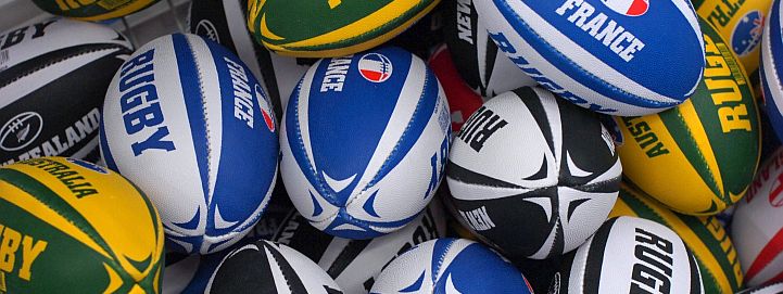 Picture of a mix of international rugby teams'  rugby balls